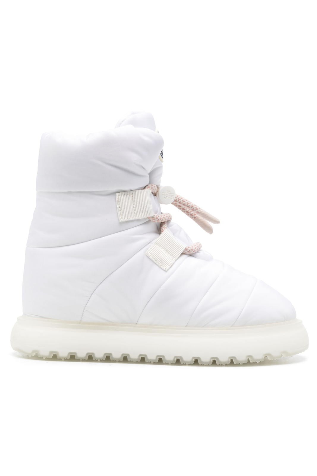 A pair of white Moncler Gaia Pull ankle boots for women, featuring a lace-up closure and a rubber sole.