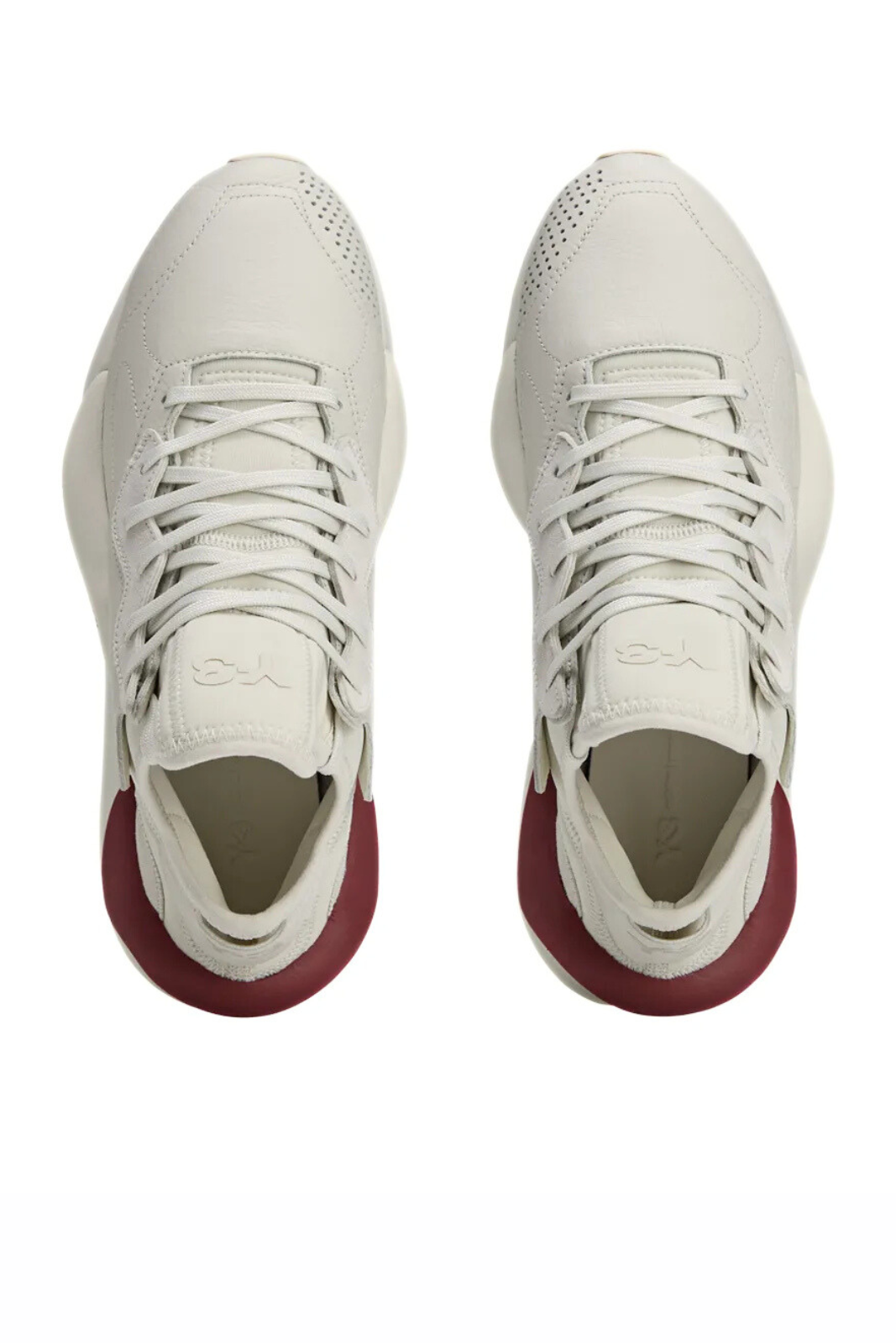 Y3 White sneakers with red soles on a white background