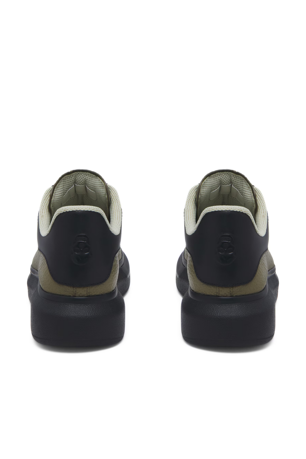 Alexander McQueen Men's Oversized Sneaker in Khaki Black, featuring a round toe, chunky black rubber sole, and a logo debossed on the toe.