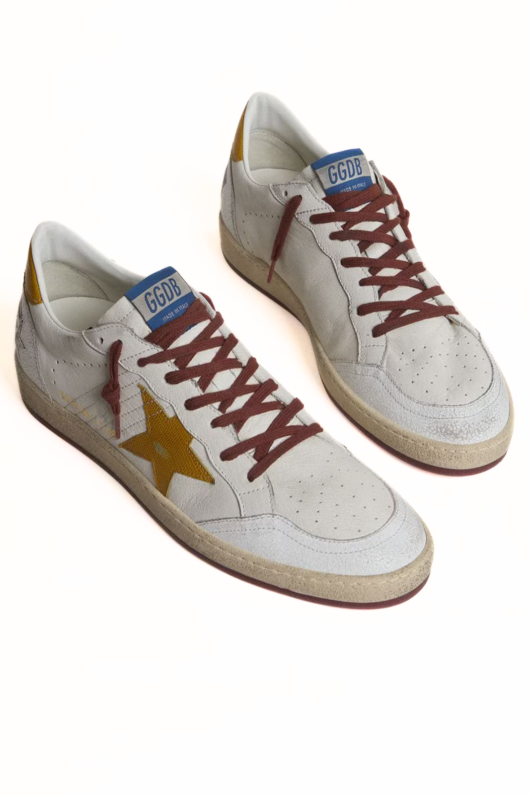 Golden Goose Men's Ball Star in white nappa leather with yellow animal-print leather star and heel tab sneakers