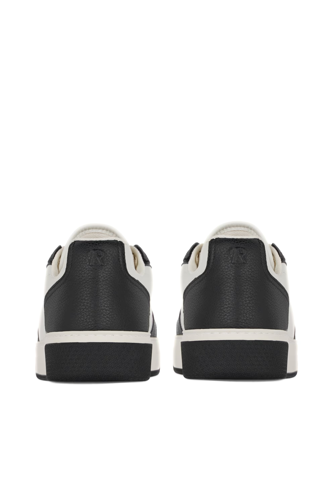 A pair of Represent Initial suede sneakers in light grey and white, featuring a low-top design with lace-up closure and a flat rubber sole.